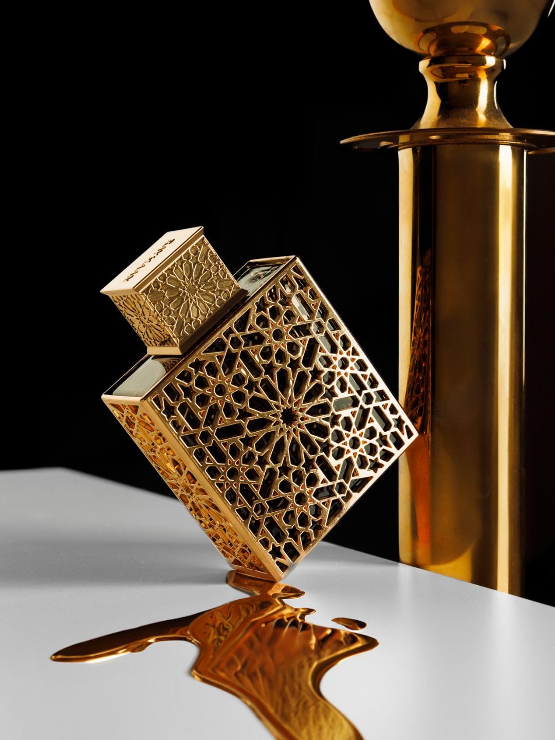Rayhaan Elixir long lasting luxury perfume spray presentation bottle sitting upright on a clean studio surface.