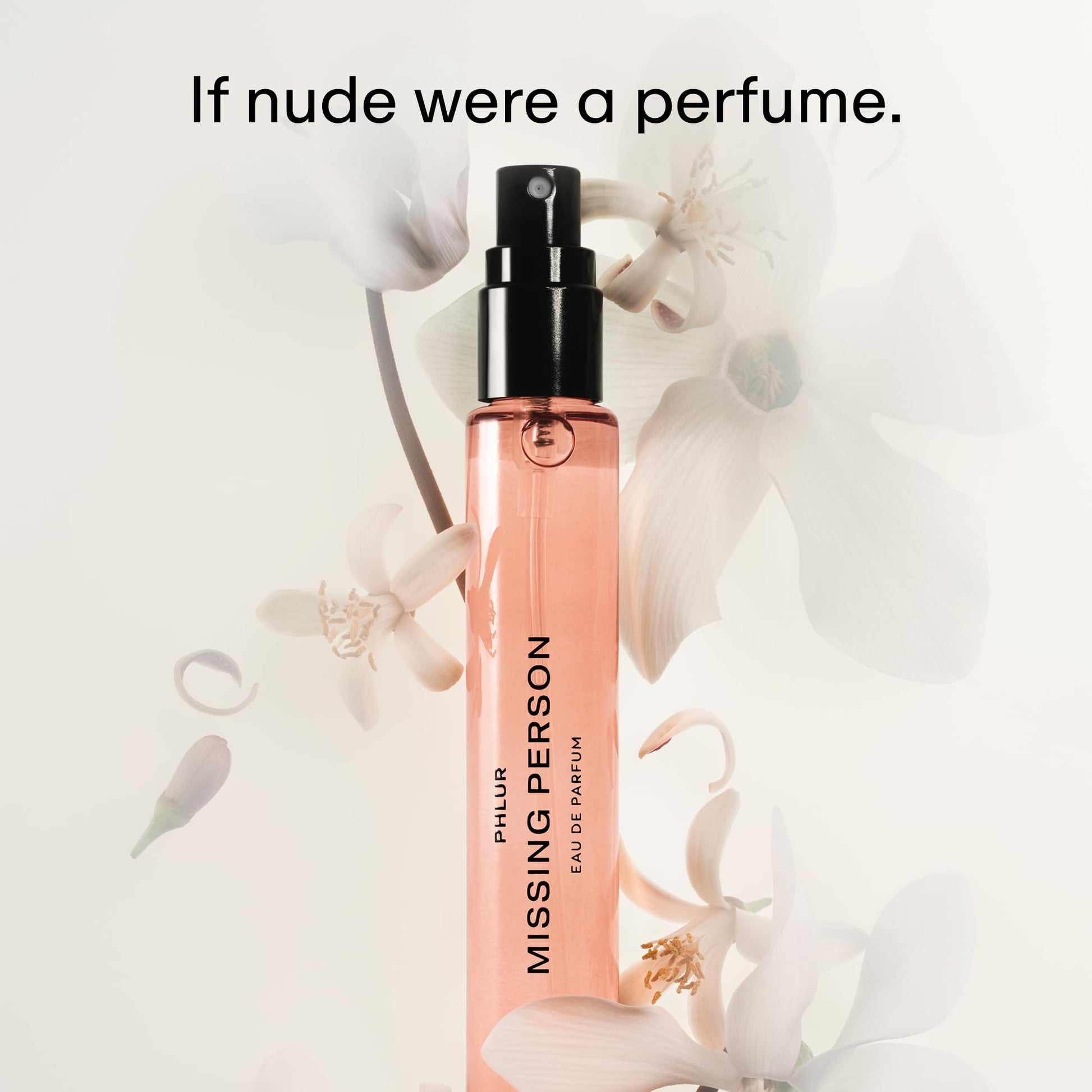 Authentic PHLUR Missing Person travel size perfume on a clean background highlighting the clear liquid vial.