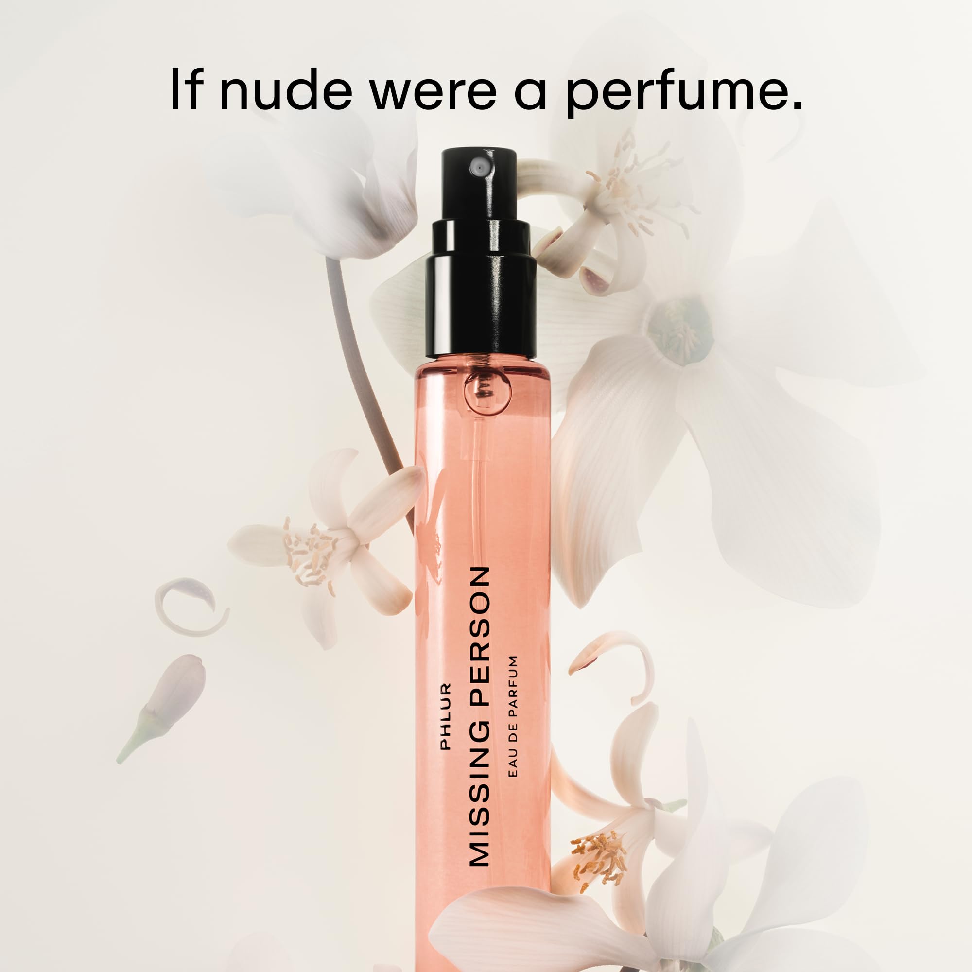 Authentic PHLUR Missing Person travel size perfume on a clean background highlighting the clear liquid vial.