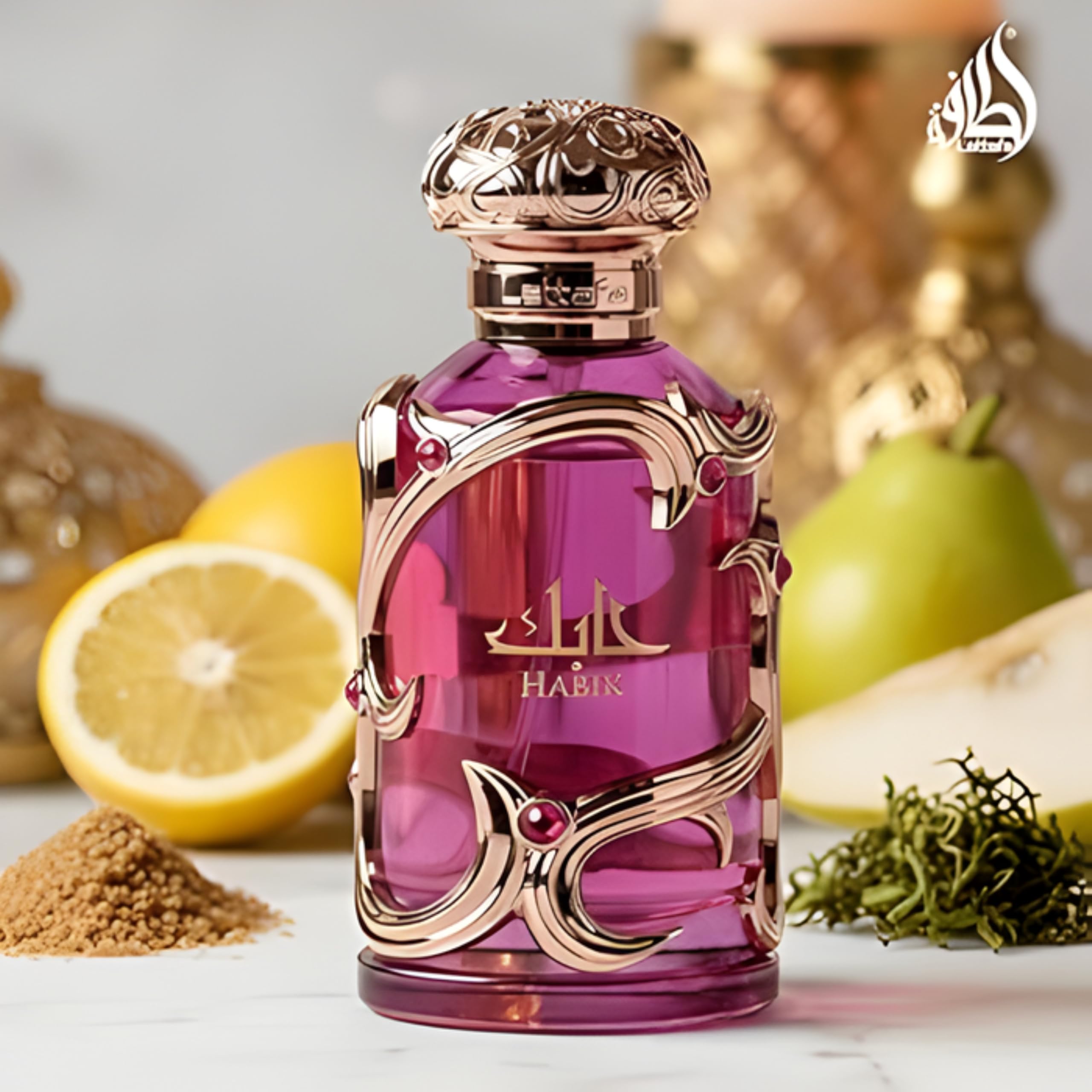 Lattafa Habik pink bottle showcasing bergamot and pear fragrance notes