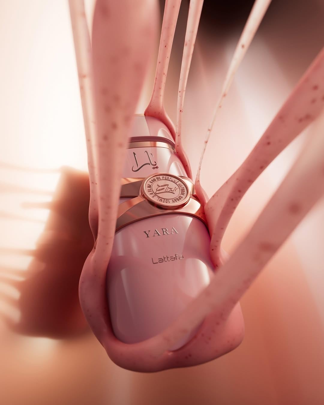 Close up of Lattafa Yara Elixir spray nozzle and decorative detailing