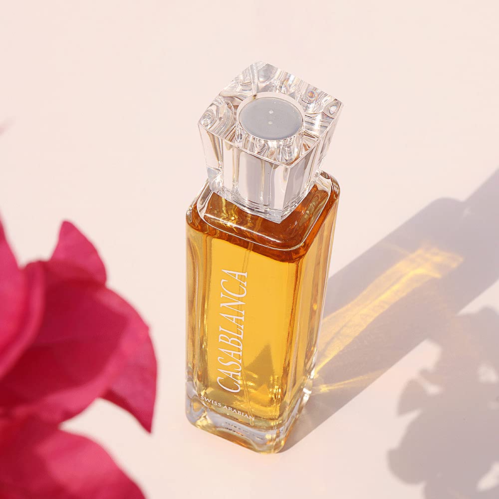 Premium imported Swiss Arabian Casablanca unisex perfume resting on clean commercial backdrop
