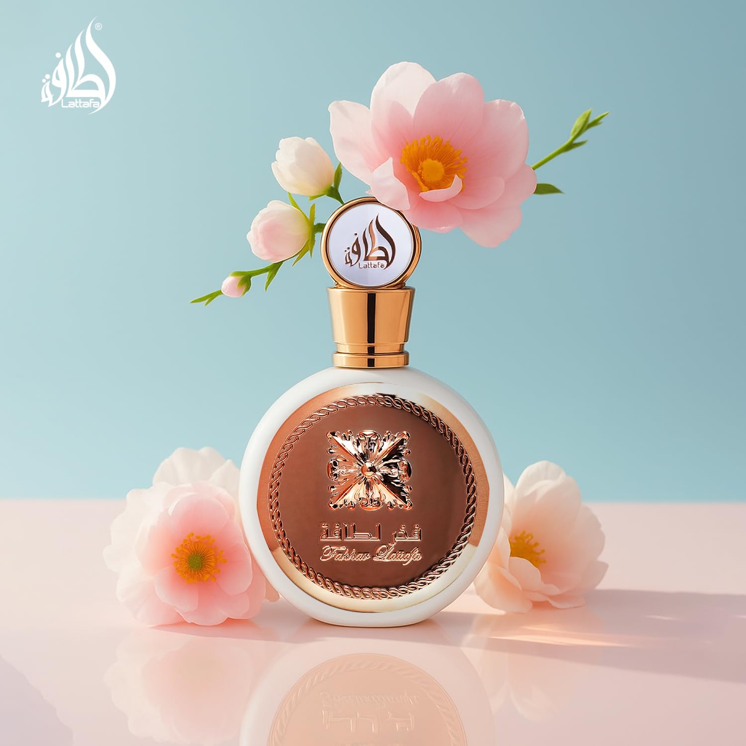 Long lasting women perfume Lattafa Fakhar elegant bottle showing intricate rose gold details