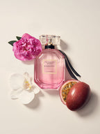 Victoria's Secret Bombshell perfume box packaging next to the signature luxury bottle for authenticity verification.