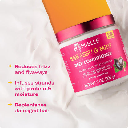 Texture shot of white creamy Mielle Organics babassu oil and mint conditioning cream