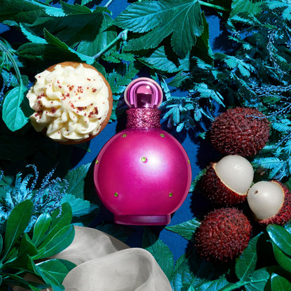 Britney Spears Fantasy Eau de Parfum bottle placed next to its signature retail carton