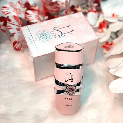 Authentic pink 100ml fragrance bottle with signature metallic embellishments