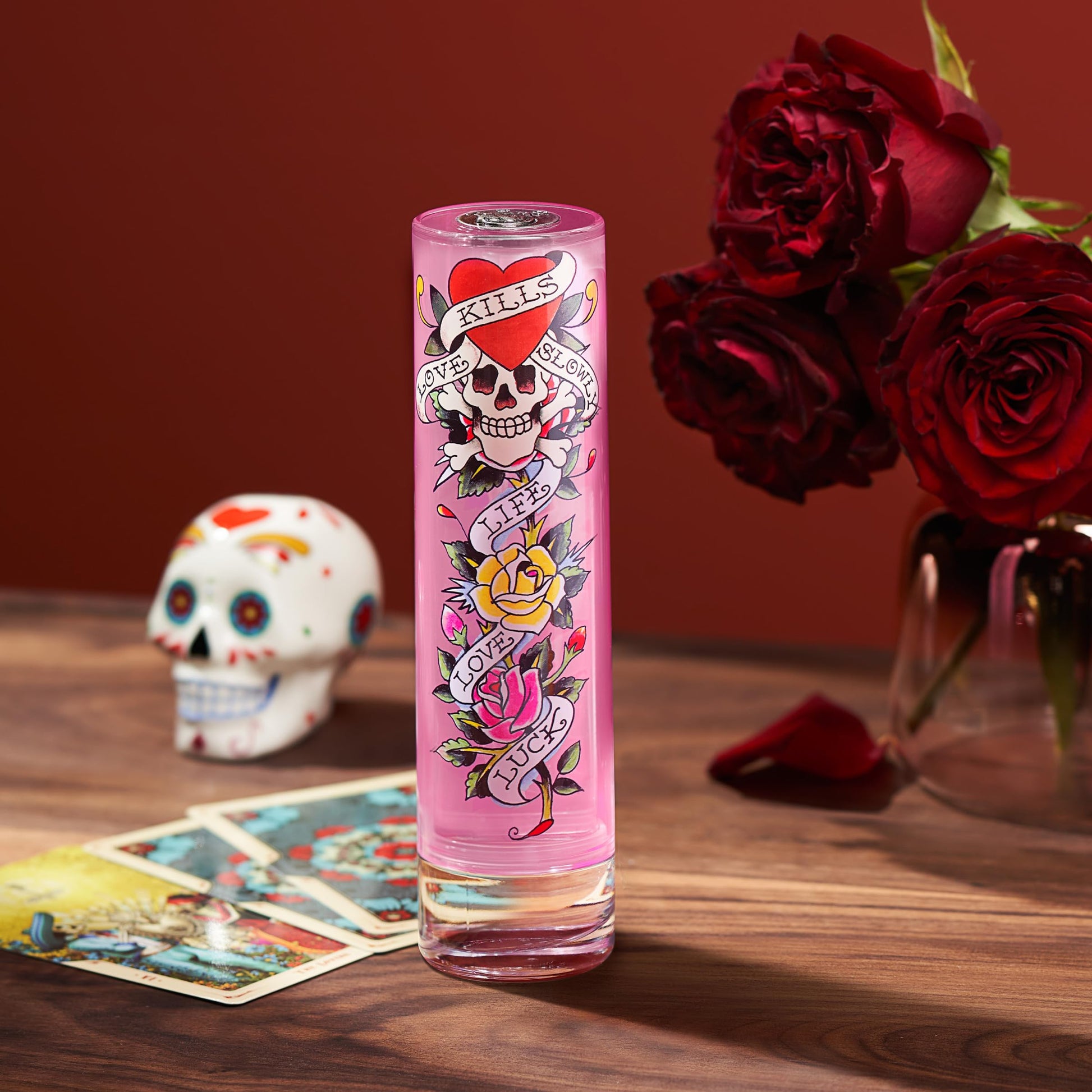 Ed Hardy Eau De Parfum 100ml bottle placed on a clean flat vanity surface