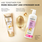 Pantene Miracle Rescue Deep Repair Conditioner held in hand for scale