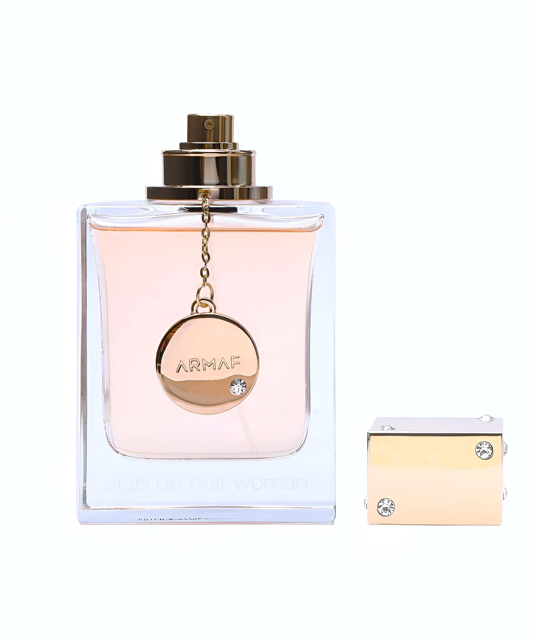 Side view of Armaf Club De Nuit feminine fragrance bottle highlighting the premium liquid color