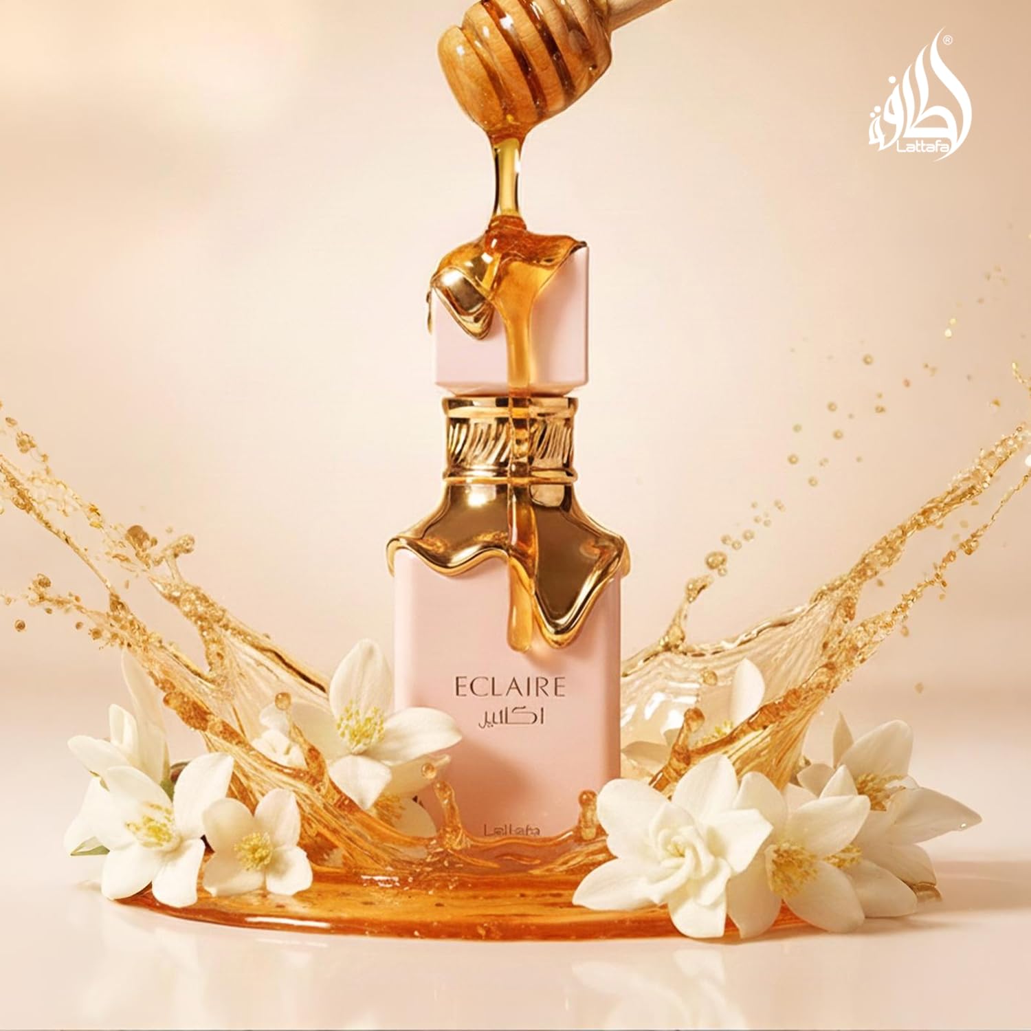 Lattafa Eclaire premium Arabic perfume highlighting the gold cap and luxurious container