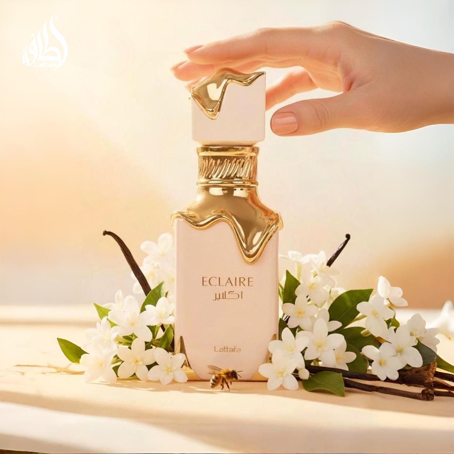 Side angle view of Lattafa Eclaire Eau De Parfum showing detailed label graphics