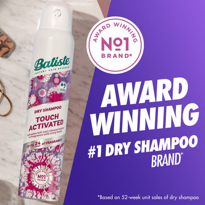 Model using Batiste dry shampoo on roots for volume
