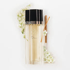 Top view of Oscar De La Renta signature floral fragrance bottle