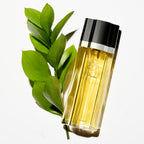 Close up of Oscar perfume brand label on glass bottle