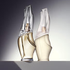 Donna Karan Cashmere Mist 2 piece luxury set unboxed on a clean white surface.