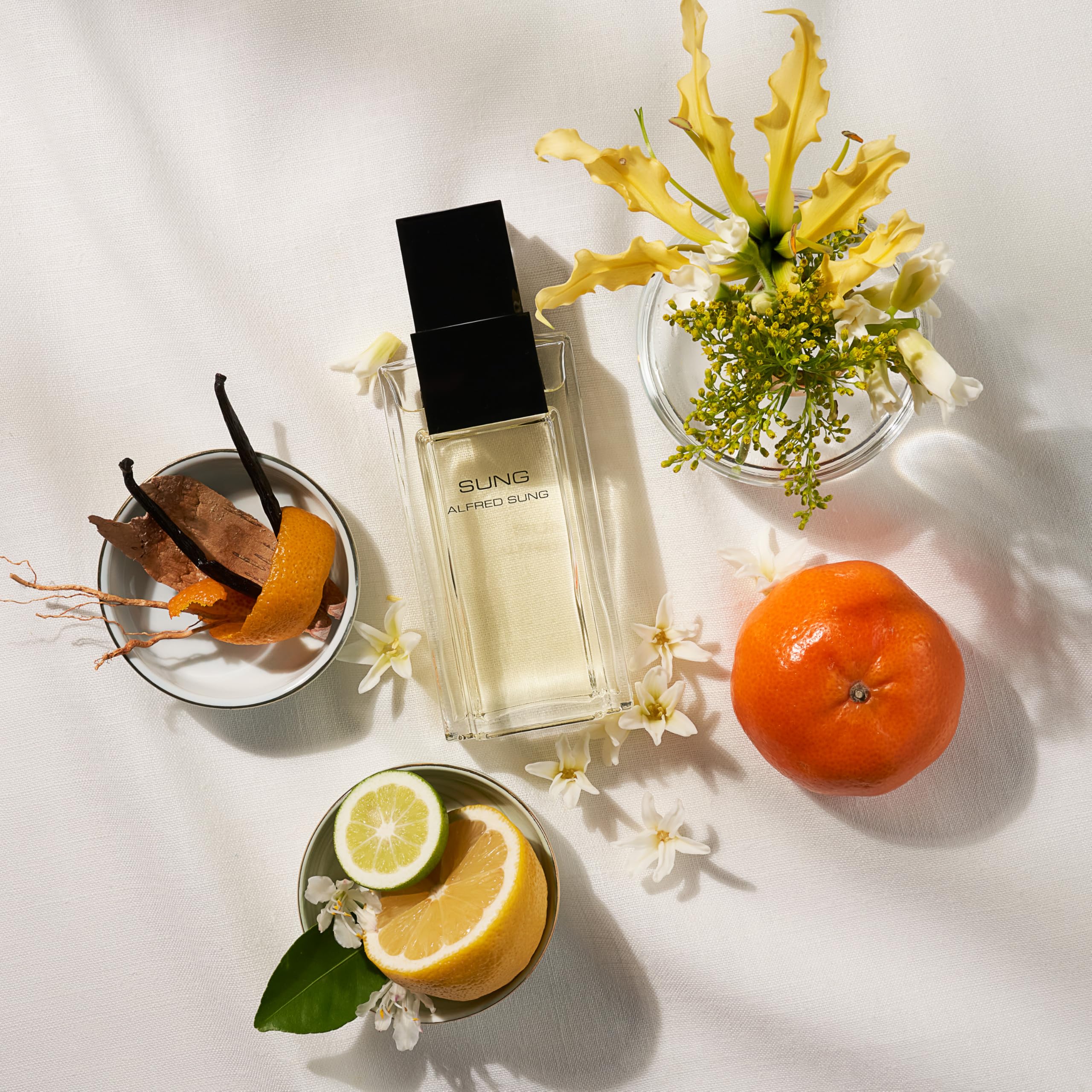 Elegant Alfred Sung 3.4 Fluid Ounce perfume bottle
