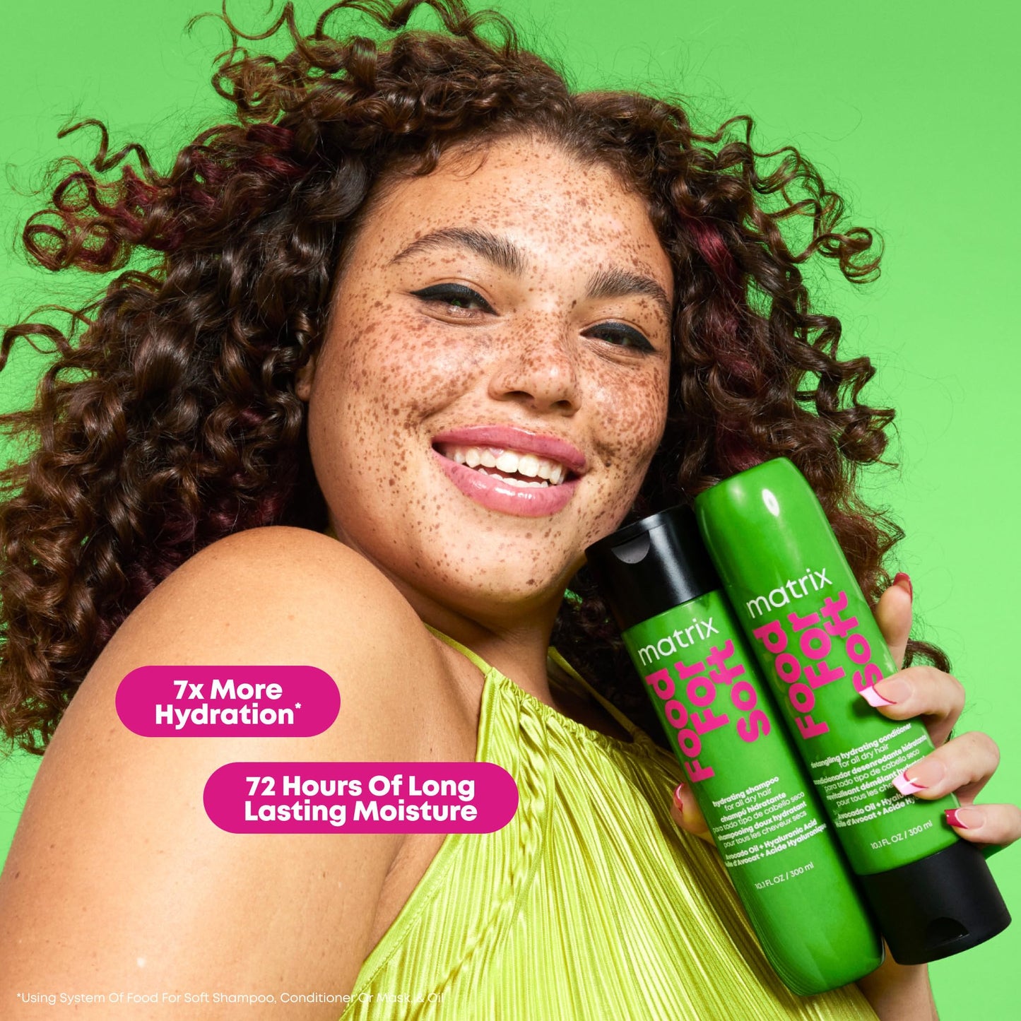 Matrix hydrating shampoo bottle close up showcasing avocado oil and hyaluronic acid ingredients.