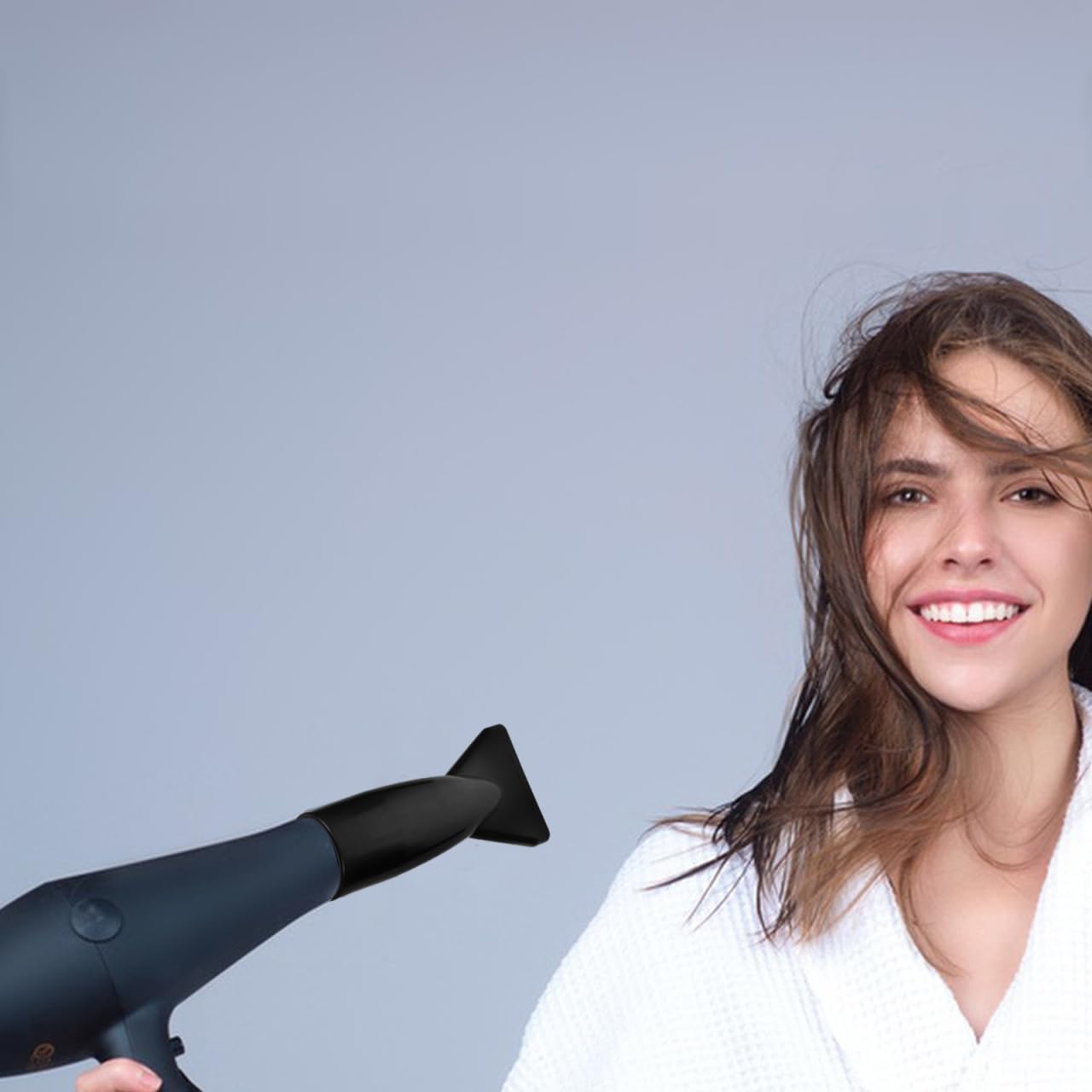 Black ABS plastic hair dryer attachments showing universal fit design mechanism