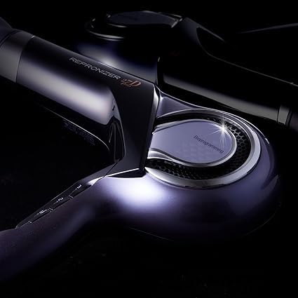Bioprogramming Repronizer 27D Plus purple and black hair styling tool resting on salon table