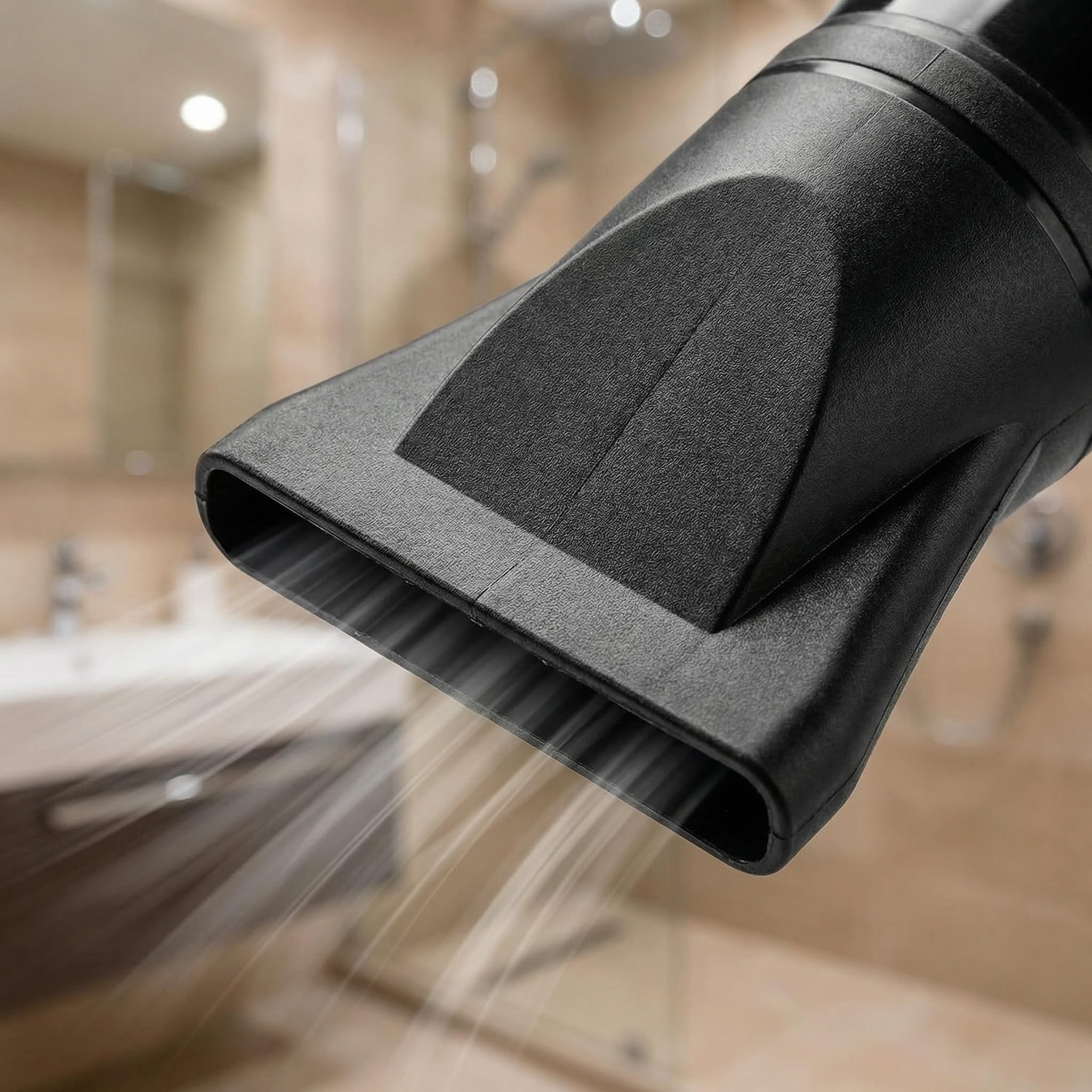 Two pieces of Kryoflare black nylon professional blow dryer nozzles isolated on a clean background