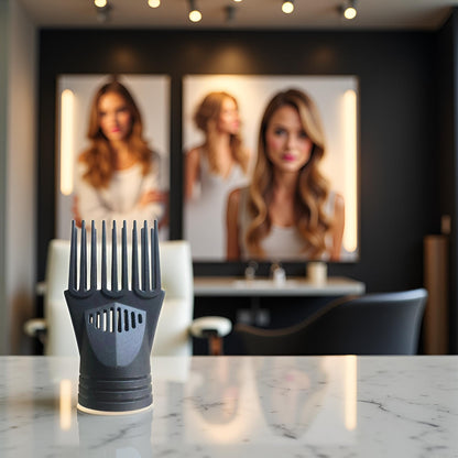 Close up of the wide teeth on the hair dryer comb attachment