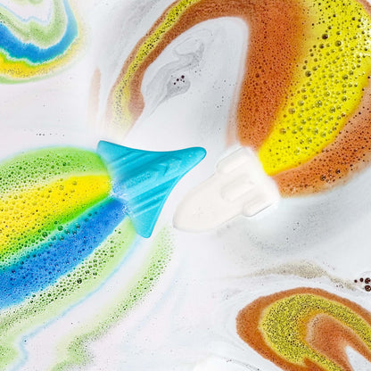 ORIGLAM kids bubble bath fizzers dissolving with rainbow color trails in water