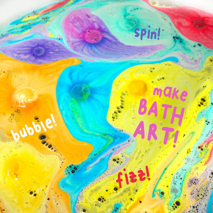 Mr. Bubble planet bath bomb fizzing and spinning in warm water.