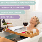 Ahila Power Of Healing aromatherapy bath bombs dissolving in a bathtub with rich colors.