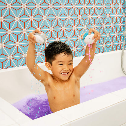 Munchkin bath water color tablets enriched with moisturizing Vitamin E and shea butter.