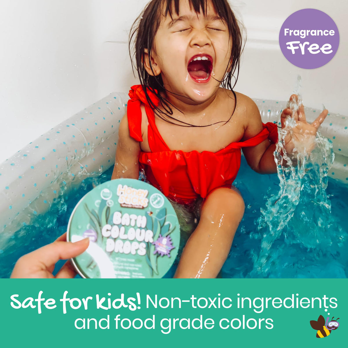Children playing with colored water in bathtub