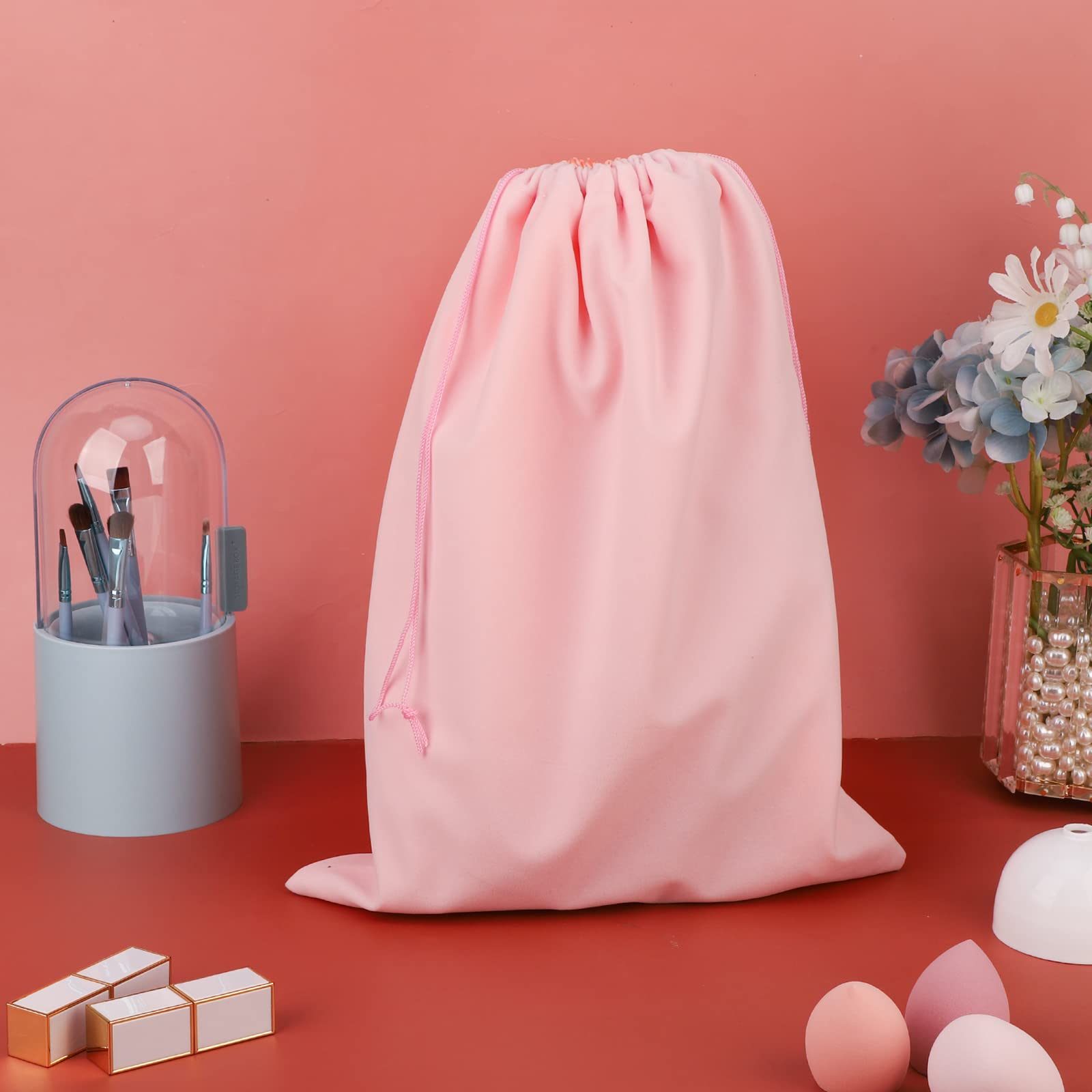 Three Segbeauty black drawstring bags laid out for storage organization