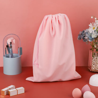 Three Segbeauty black drawstring bags laid out for storage organization