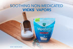 Vicks VapoBath pouch displayed next to a warm bathtub