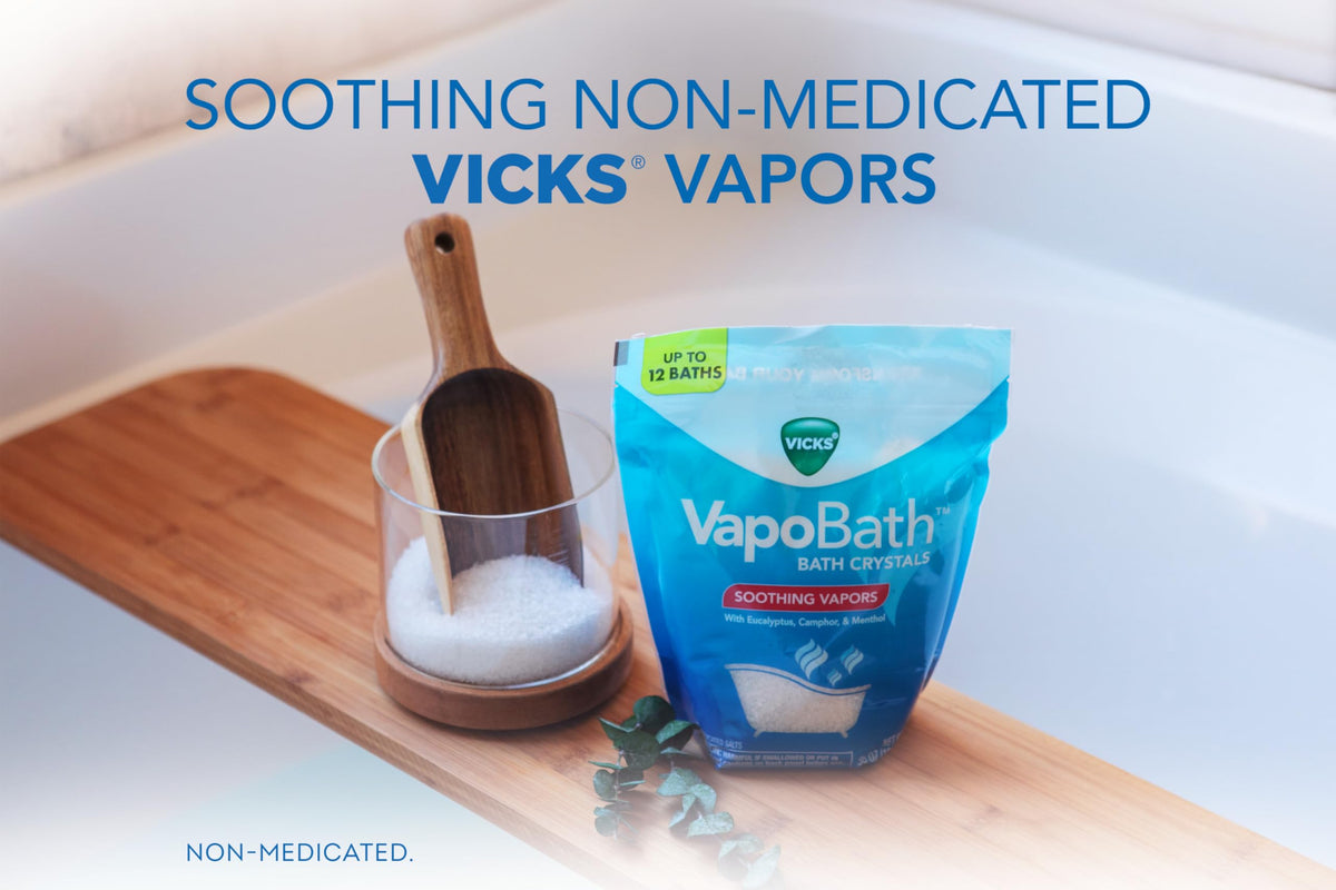 Vicks VapoBath pouch displayed next to a warm bathtub