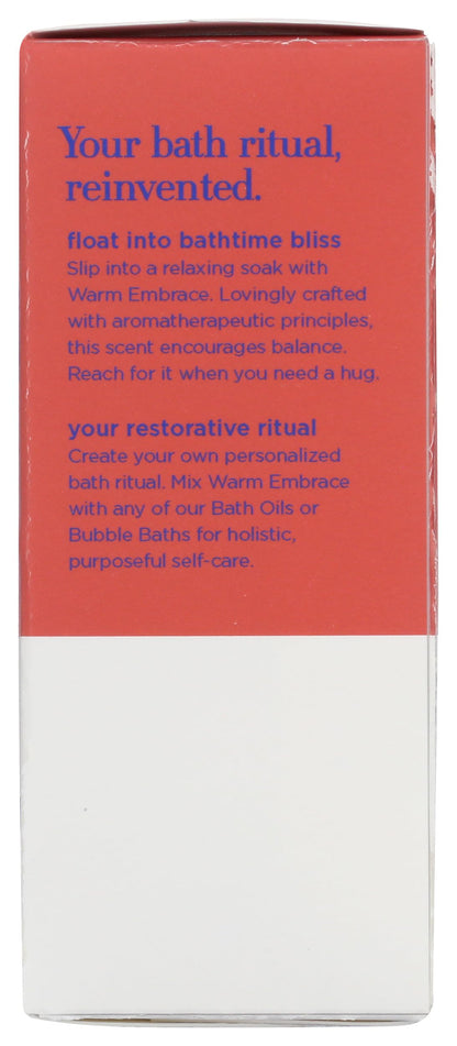 Close-up of the 4 Fluid Ounce packaging for EO Warm Embrace essential oil bath soak.
