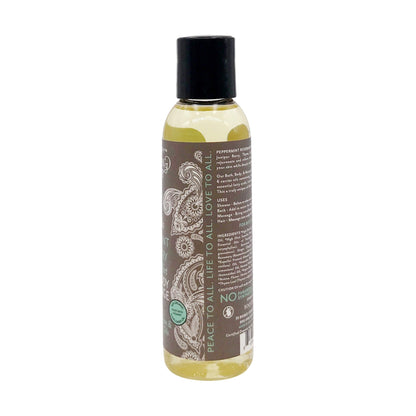 Organic premium spa oil bottle showing ingredient label with argan oil