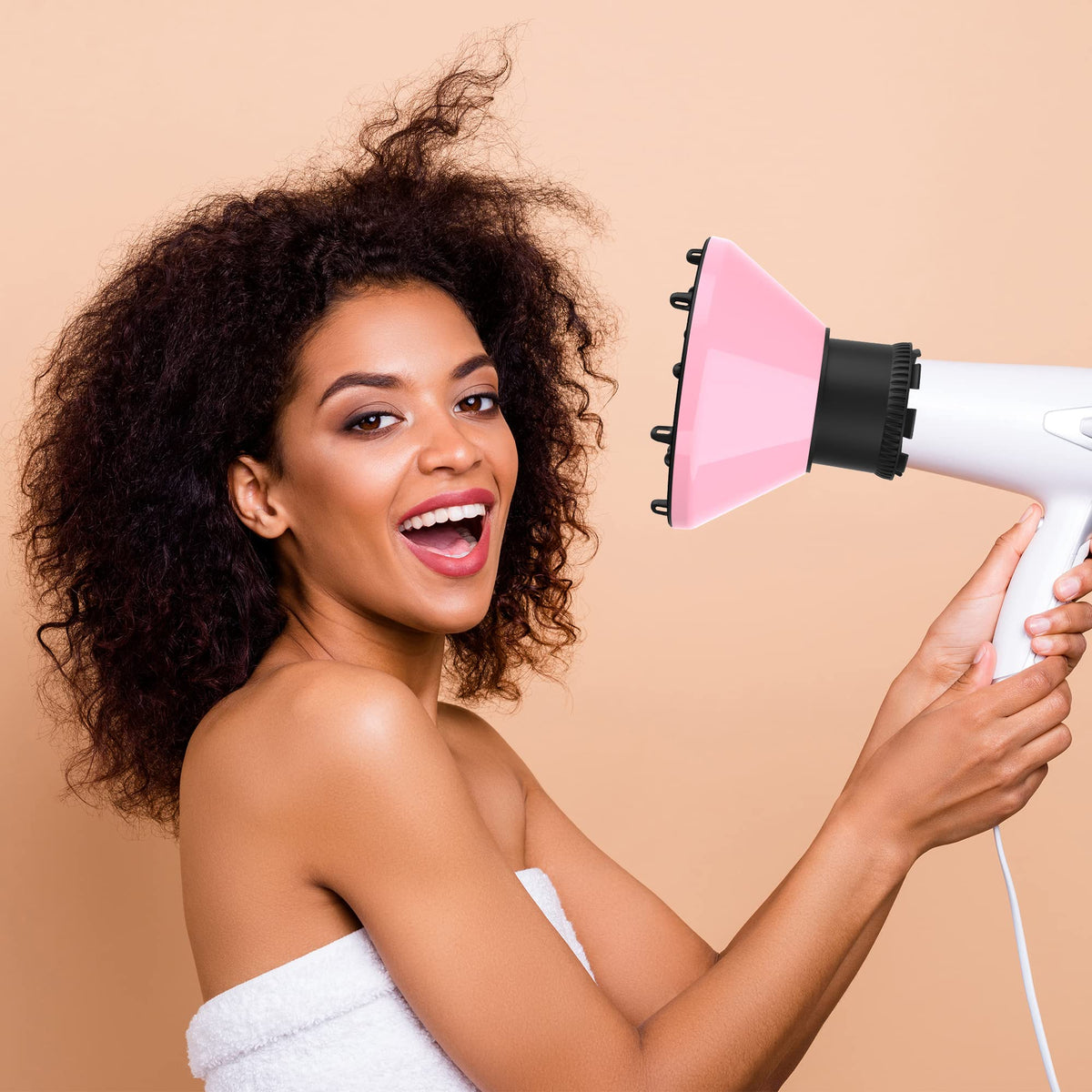 RIJATRAGAR professional pink diffuser attached to a blow dryer nozzle demonstrating secure slip on installation