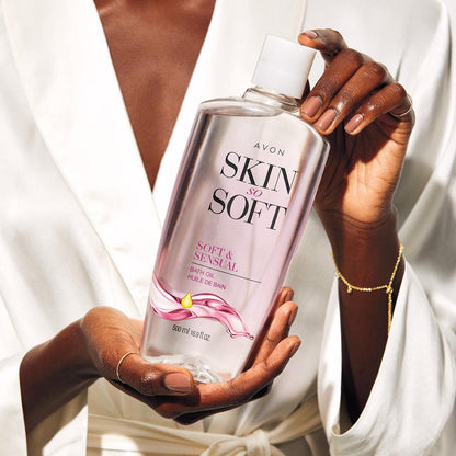 Imported American luxury bath oil showing the clear liquid formula and secure closure cap
