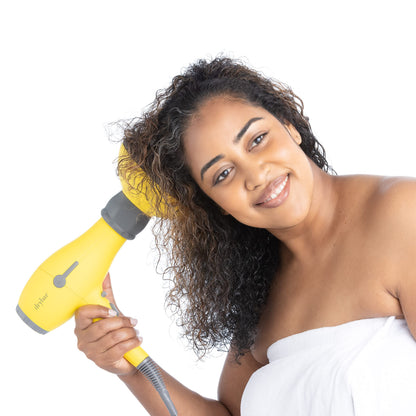 Drybar yellow and grey hair diffuser attachment unboxed against a neutral background.