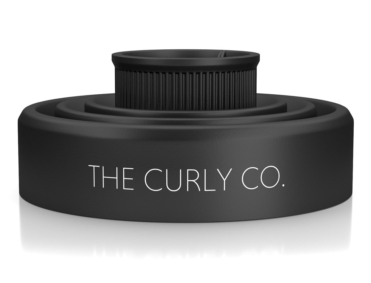 The Curly Co. Black Silicone Diffuser showing the inside bowl and air distribution holes for frizz control.