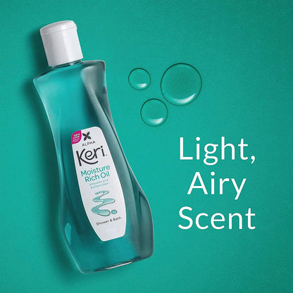 Keri Moisture Rich Shower and Bath Oil placed next to a fresh white towel emphasizing a luxury home spa experience.