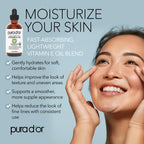 Pura D'Or vitamin E oil dropper bottle close up