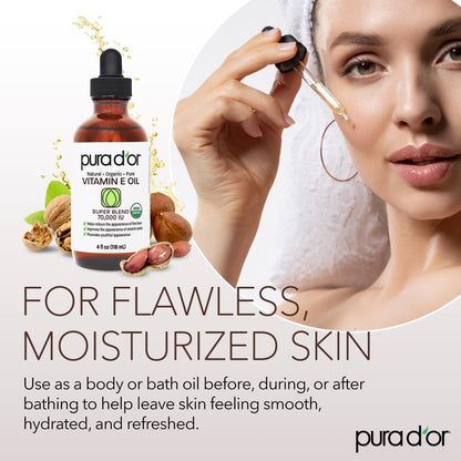 PURA D'OR Vitamin E oil bottle alongside organic argan and jojoba cosmetic ingredients