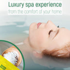 Person preparing warm foot soak with magnesium bath flakes