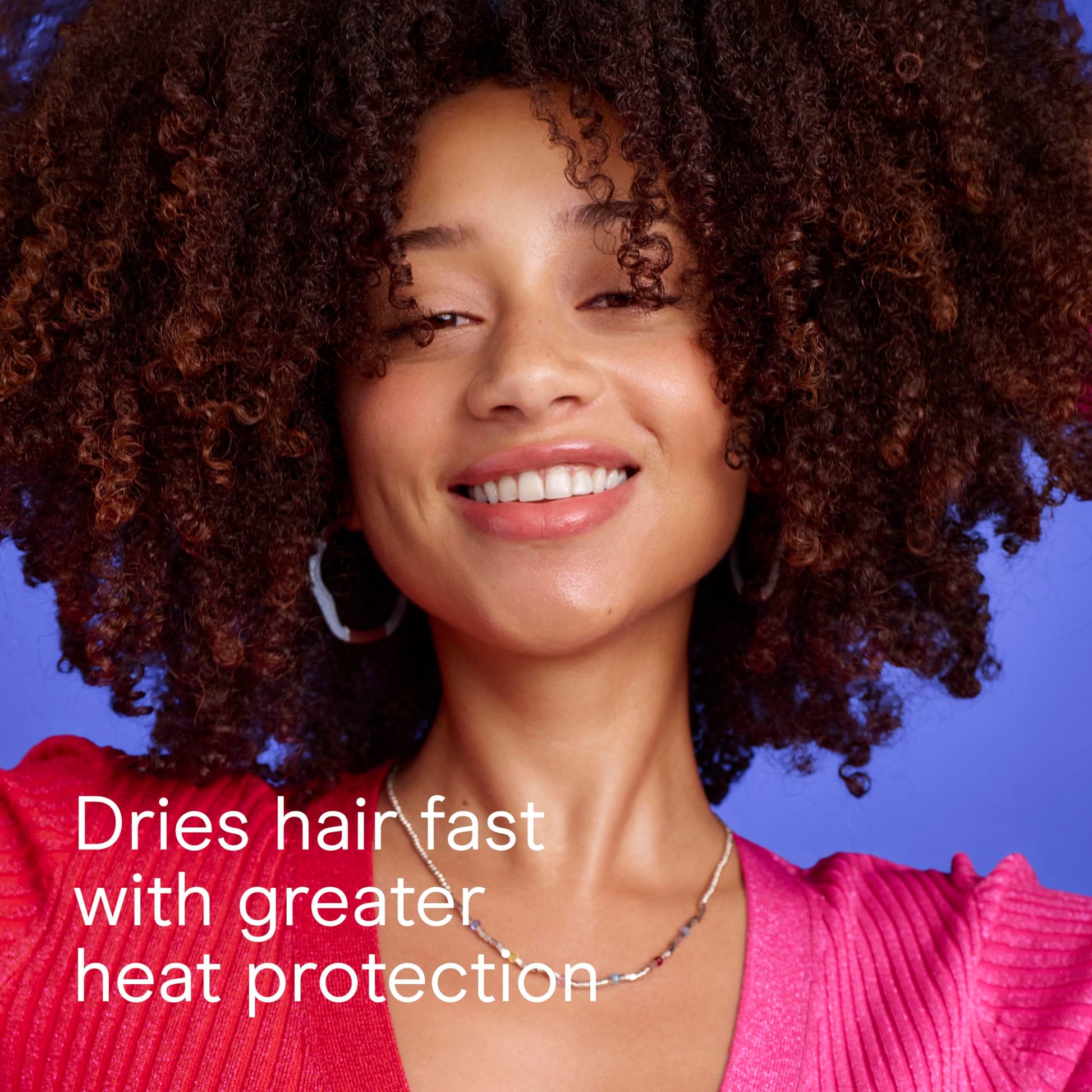 Top down perspective of the oversized bowl on the Conair universal diffuser illustrating its capacity for holding long curly hair.