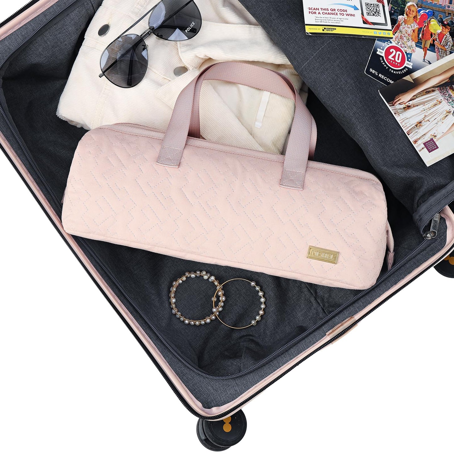 NISHEL travel organizer packed with multi-styler tools and accessories