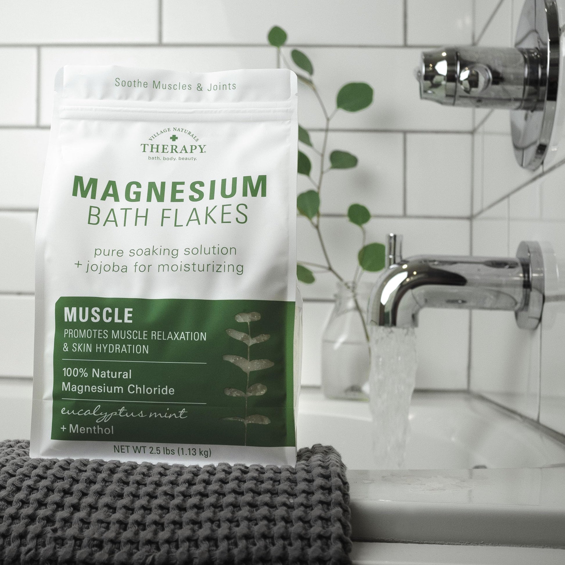 Back of Village Naturals Therapy magnesium flakes bag with ingredients