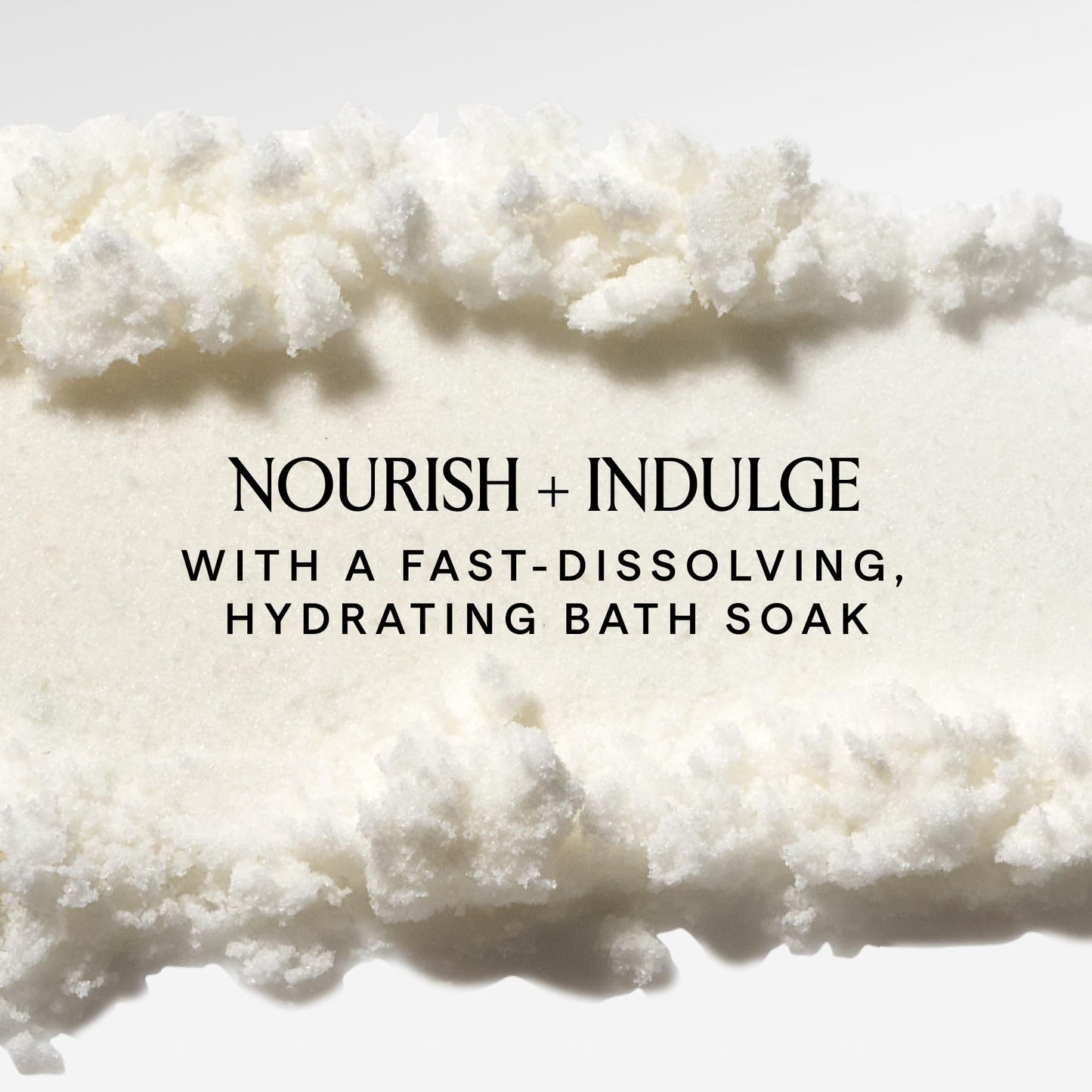 Lifestyle shot of Herbivore Botanicals bath soak in a bathtub