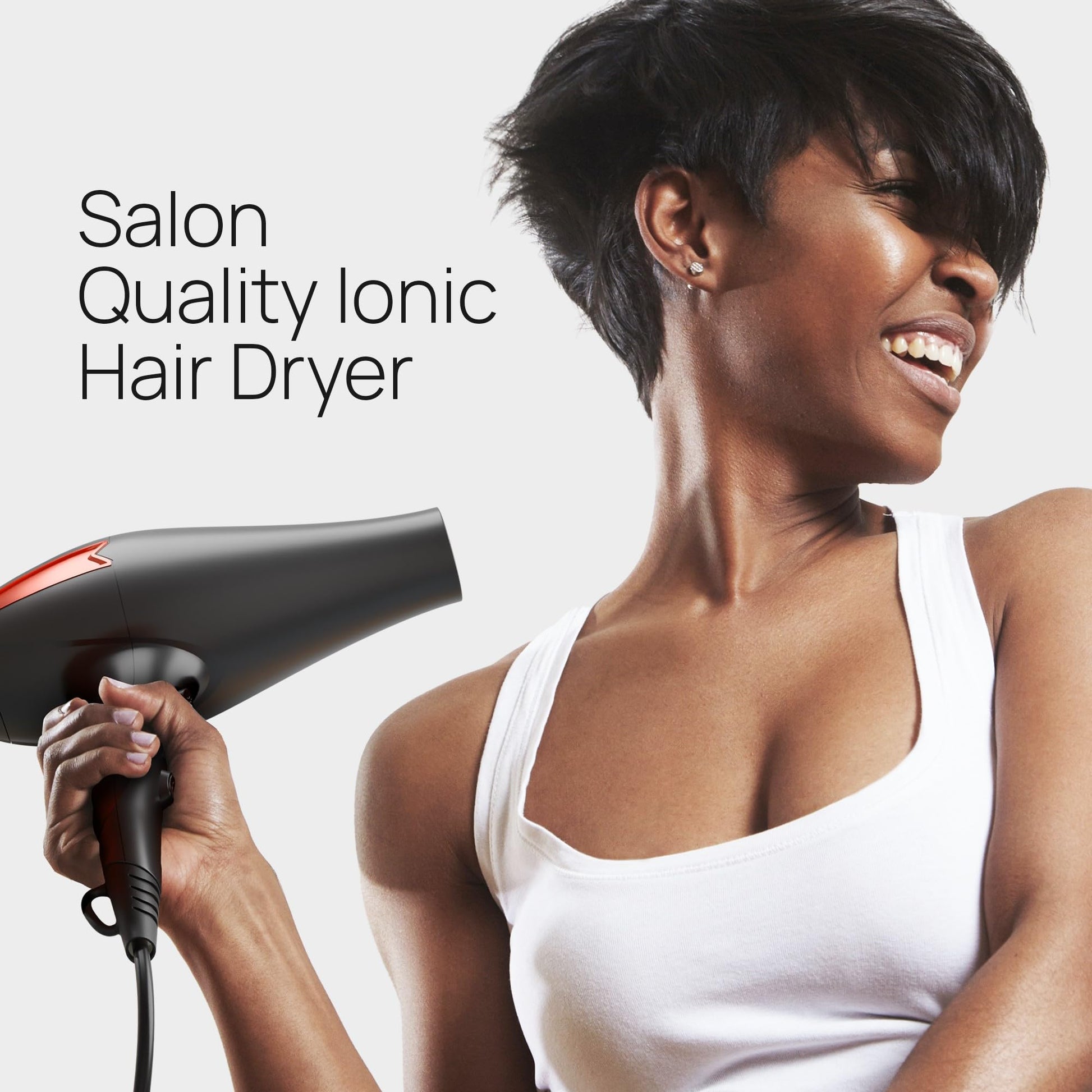 TREZORO salon blow dryer showcasing 2000W motor buttons and red accents
